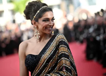 Cannes: Deepika walks the red carpet in a black and golden Sabyasachi sari