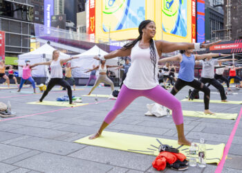 YOGIS RETURN TO TIMES SQUARE FOR THE 20TH ANNIVERSARY OF SOLSTICE IN TIMES SQUARE: MIND OVER MADNESS YOGA