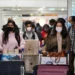 China to resume issuing passports, visas as virus curbs ease